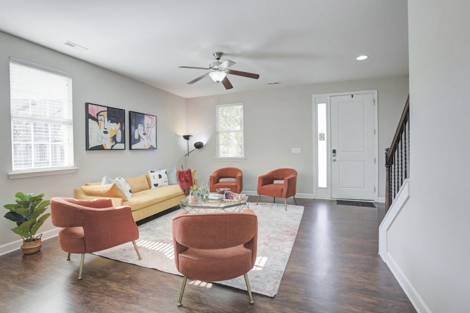 Spacious living room with modern furnishings at Charleston Row Townhomes
