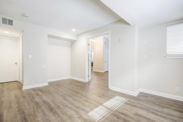 Modern bedroom with chic decor at The Spoke at Tyvola Station Apartments in Charlotte