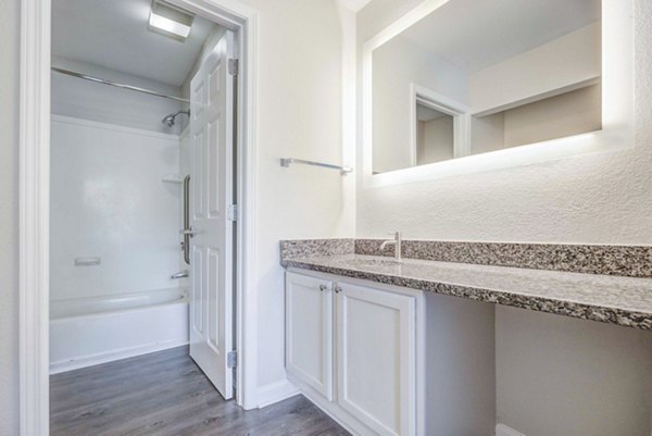 Modern bathroom with sleek fixtures at The Spoke at Tyvola Station Apartments