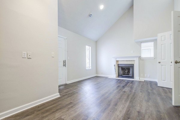 Spacious living room featuring modern decor at The Spoke at Tyvola Station Apartments