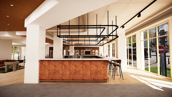 Modern bar area with high stools and large windows.