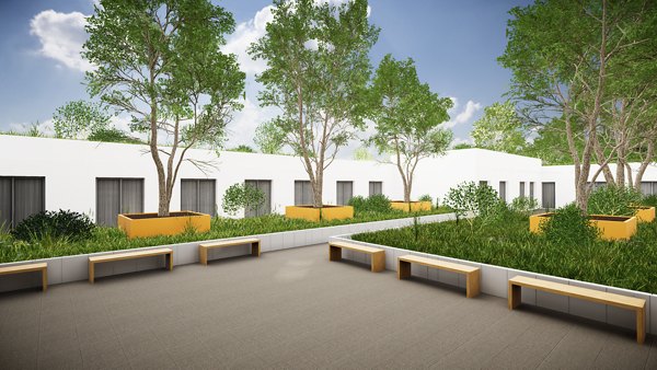 Courtyard with trees, green spaces, and benches.