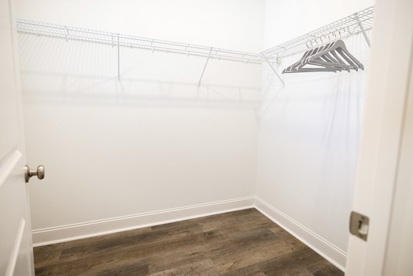 Bedroom closet with custom shelving in Reve on the Creek Apartments