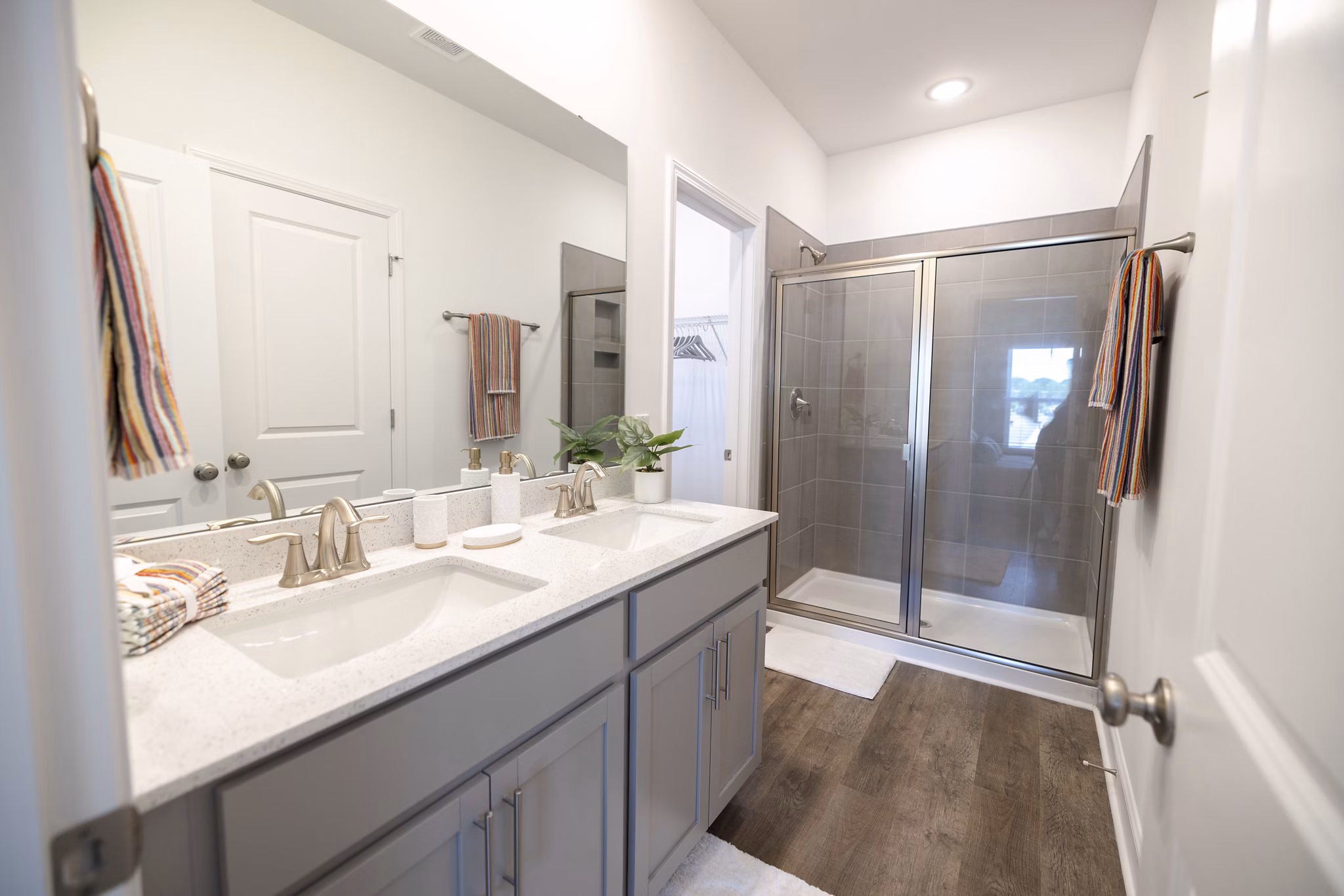 Modern bathroom with sleek fixtures at Reve on the Creek Apartments