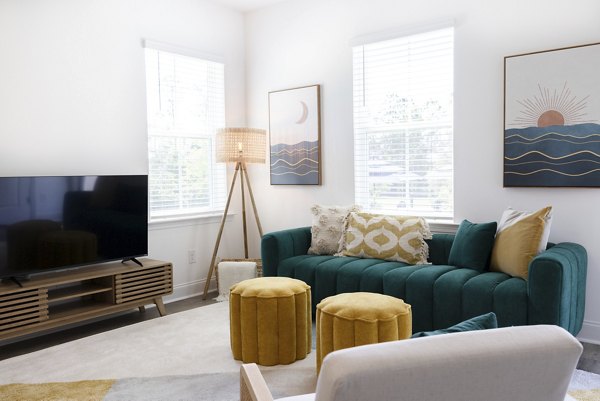 living room at Reve on the Creek Apartments