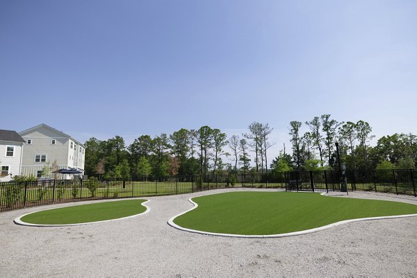 practice putting green at Reve on the Creek Apartments