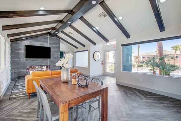 Clubhouse featuring stylish modern design and seating areas at Citron Apartments