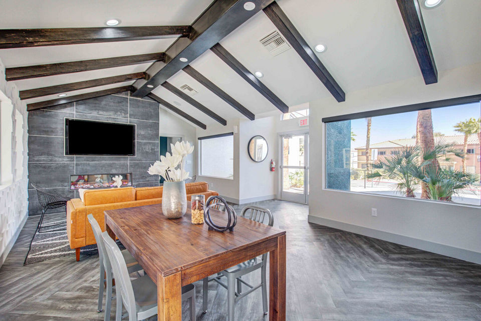 Clubhouse featuring stylish modern design and seating areas at Citron Apartments