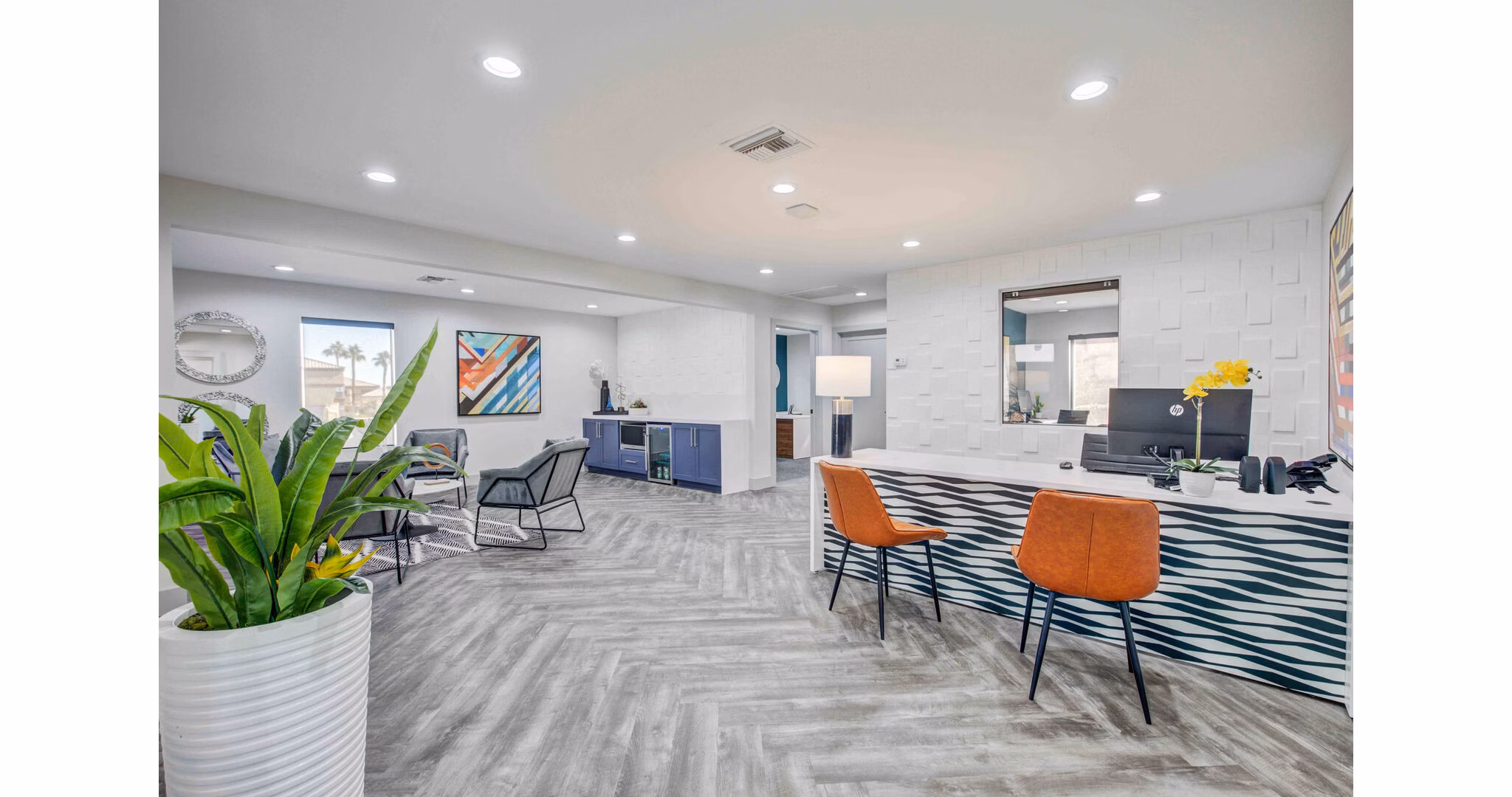 Clubhouse featuring modern decor and seating areas at Citron Apartments