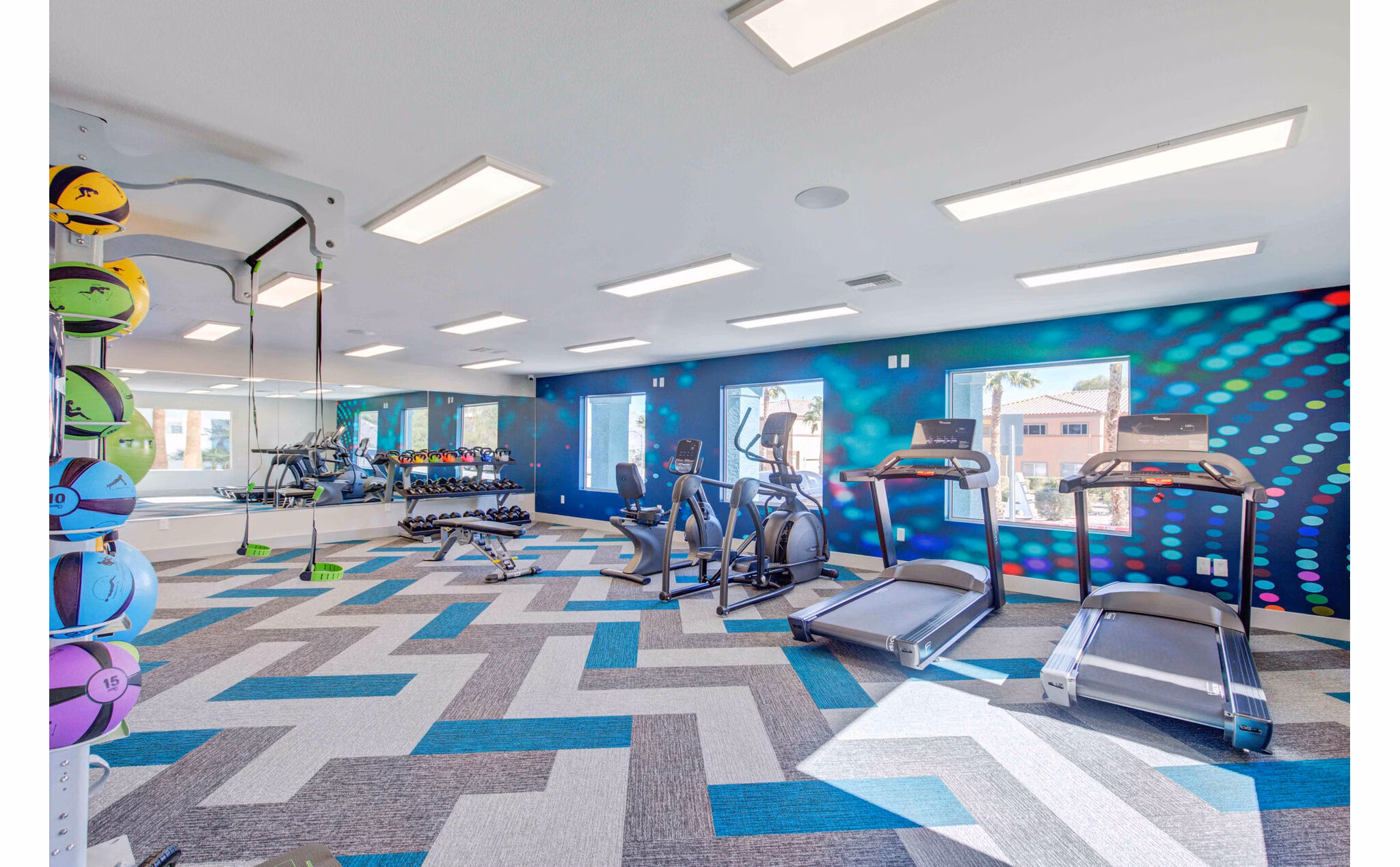 Modern fitness center with top-of-the-line equipment at Citron Apartments, offering luxury amenities for an active lifestyle