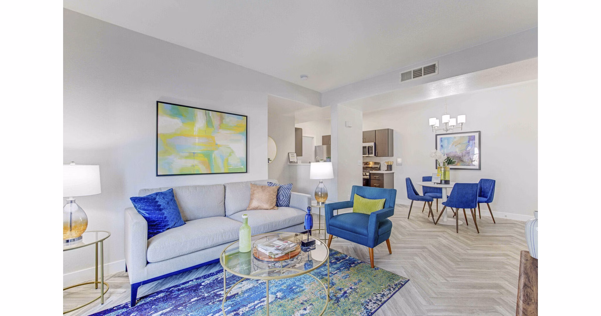 Spacious living room with modern decor and natural light in Citron Apartments
