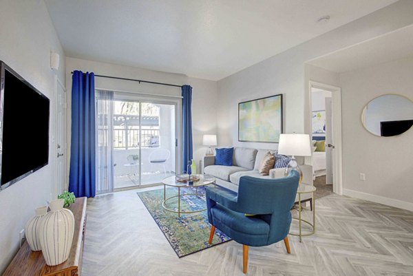 Spacious living room with modern decor at Citron Apartments
