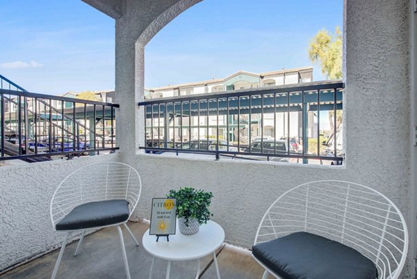 Spacious outdoor patio with modern seating at Citron Apartments