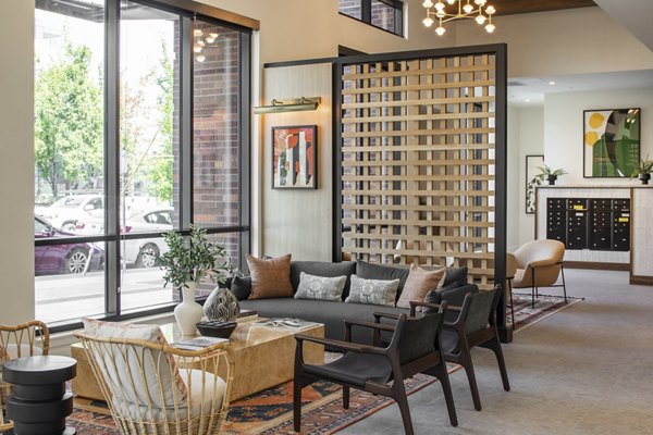 Lobby featuring elegant modern decor at luxury Millhouse Apartments, a Greystar community