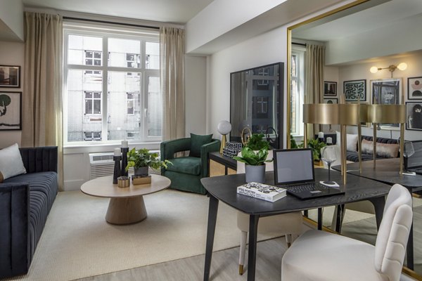 Lobby featuring modern seating and bright lighting in Millhouse Apartments