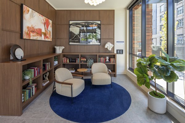 Lobby featuring modern design and elegant seating in Millhouse Apartments