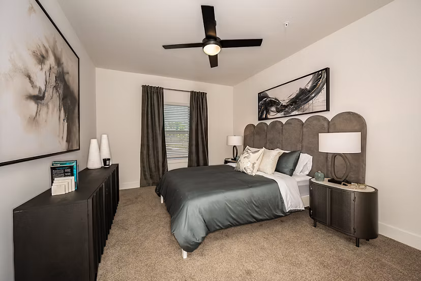 Cozy bedroom with modern decor at Perla Apartments