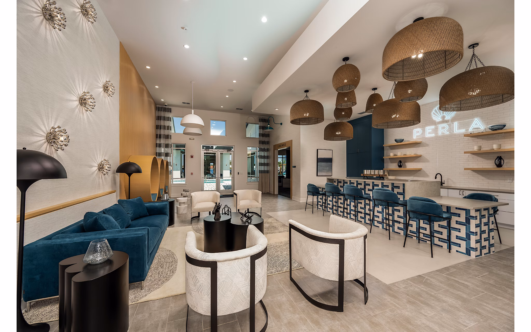 Clubhouse with modern design and communal spaces at Perla Apartments, luxury living by Greystar