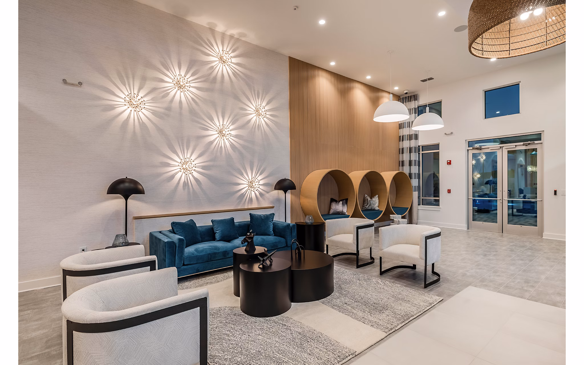 Perla Apartments: Contemporary clubhouse with stylish dÃ©cor and ample seating in vibrant downtown location