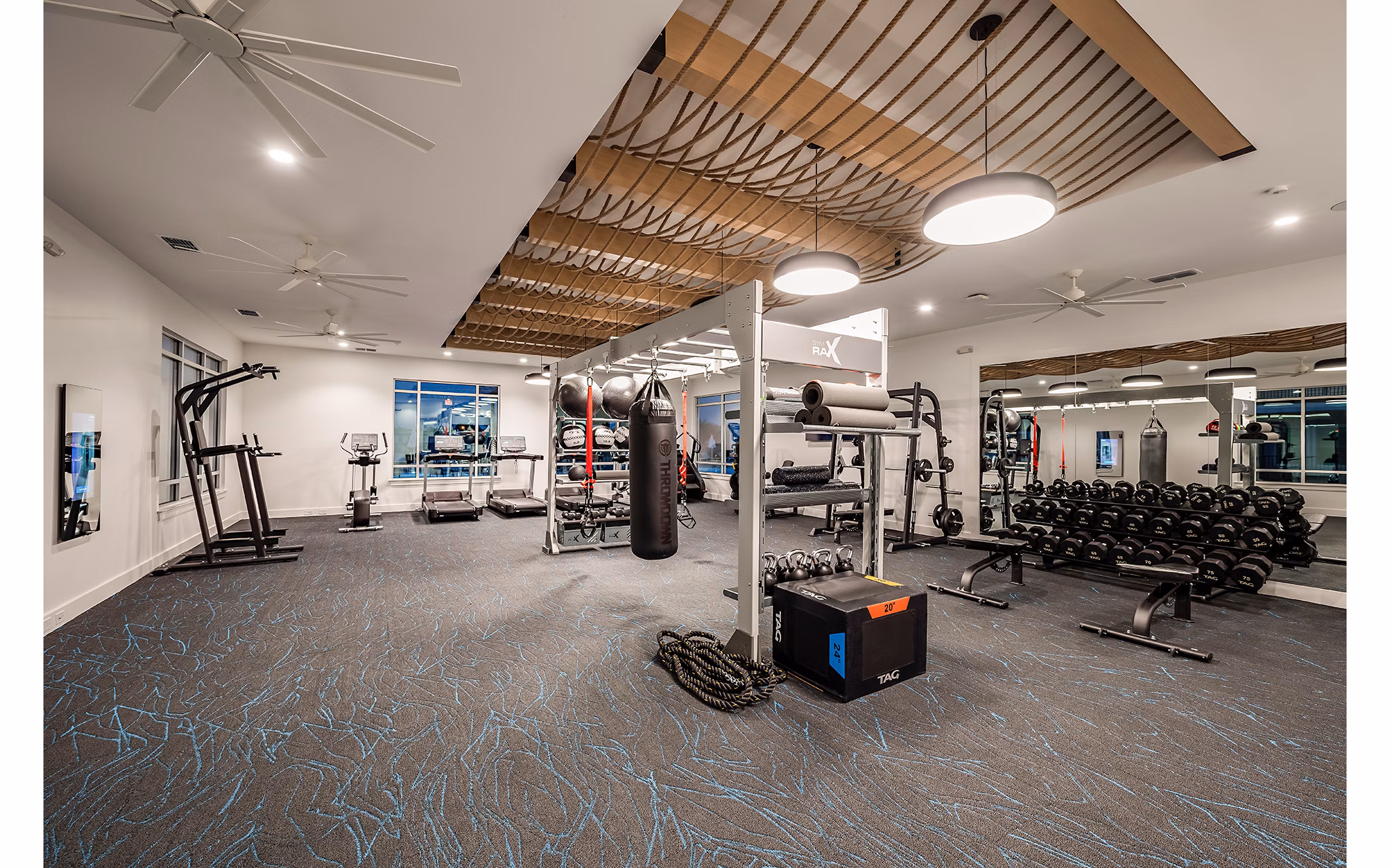 State-of-the-art fitness center with modern equipment at Perla Apartments in downtown Los Angeles