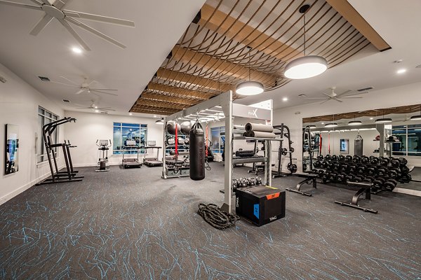 State-of-the-art fitness center with modern equipment at Perla Apartments in downtown Los Angeles