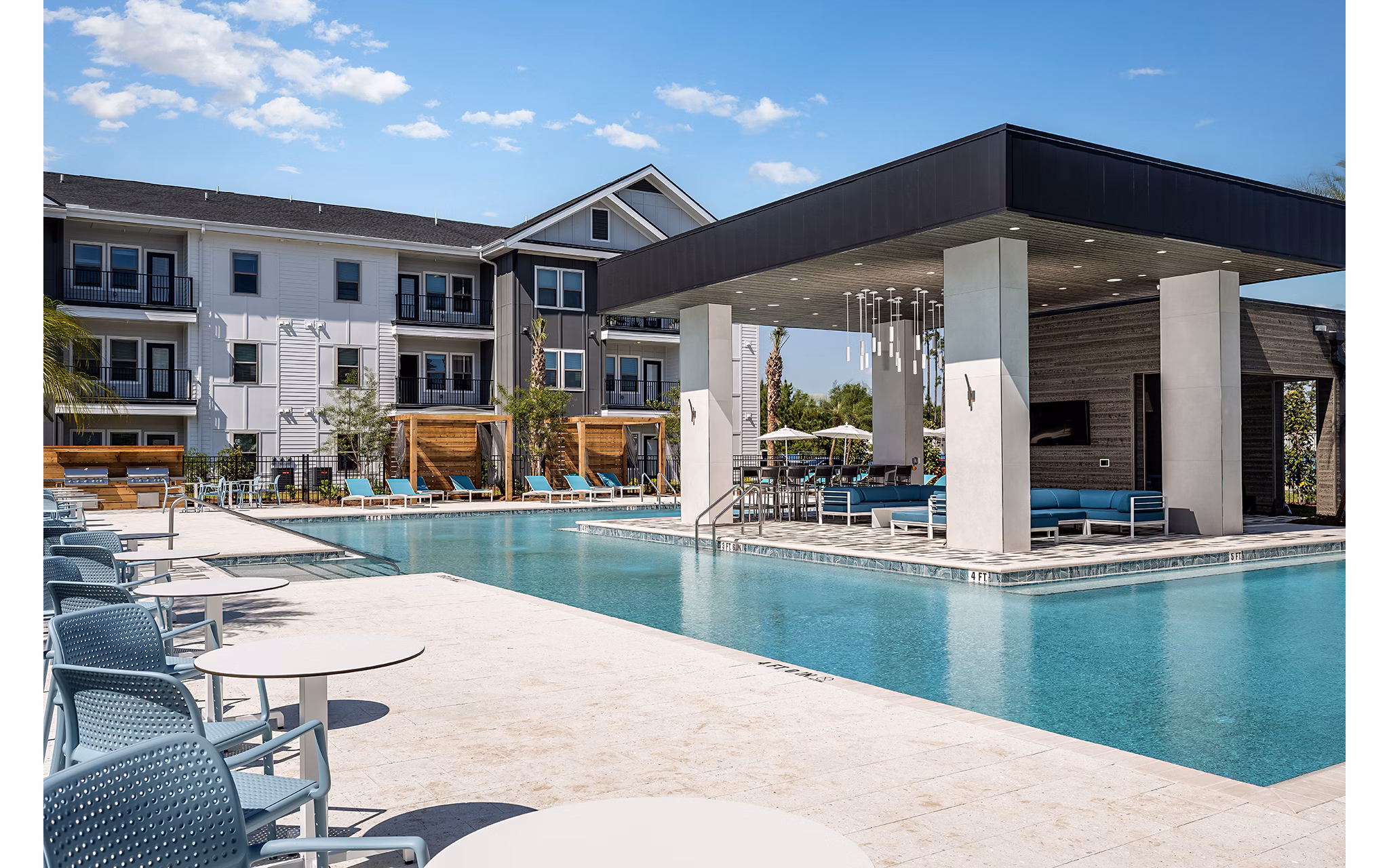 Luxurious pool at Perla Apartments offering stunning views and modern amenities for relaxation and recreation