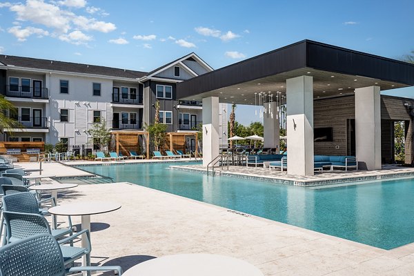 Luxurious pool at Perla Apartments offering stunning views and modern amenities for relaxation and recreation