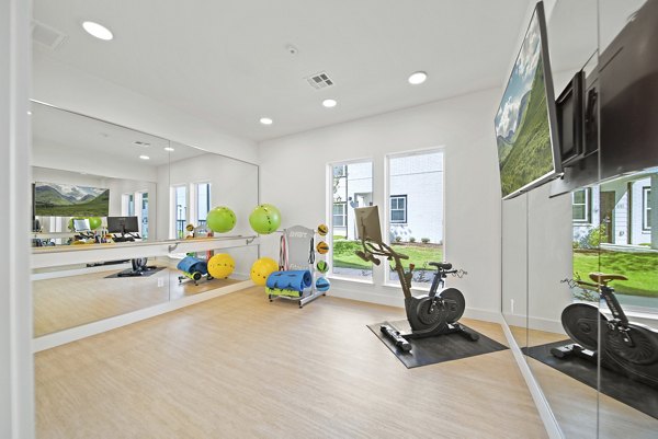 Yoga and spin studio with modern equipment at Emerson at Trace Apartments