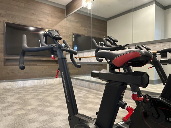 Fitness center equipped with cardio machines at The Fitzroy at Lebanon Marketplace Apartments, Group exercise area in luxury community