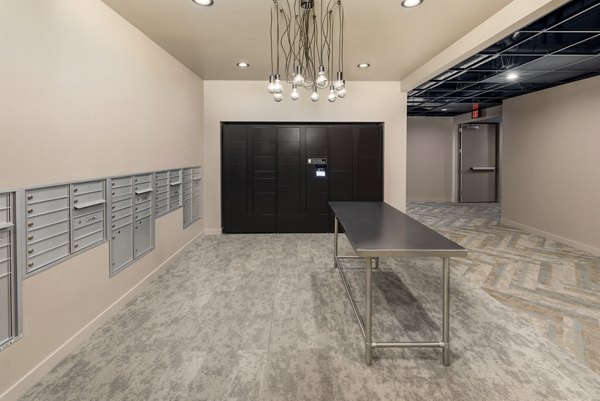 Mail room with secure parcel lockers at The Lofts at Westgate Apartments
