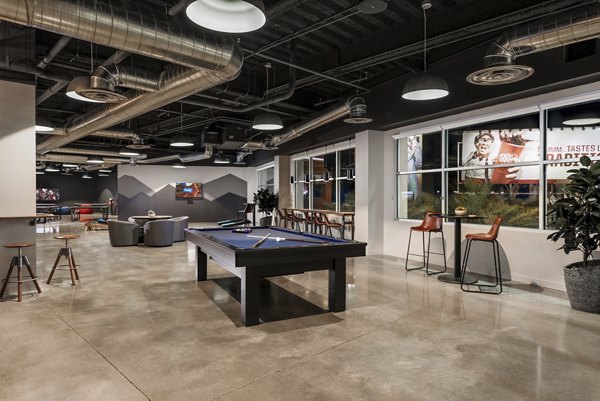 Clubhouse with modern decor and seating at The Lofts at Westgate Apartments