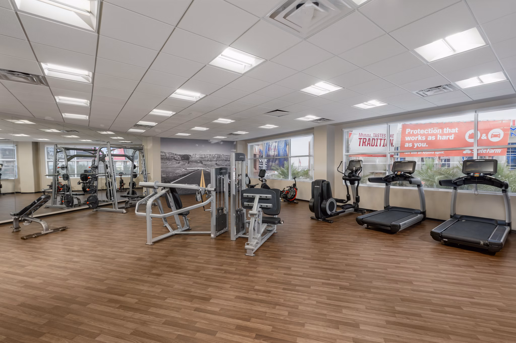 Modern fitness center with advanced equipment at The Lofts at Westgate Apartments