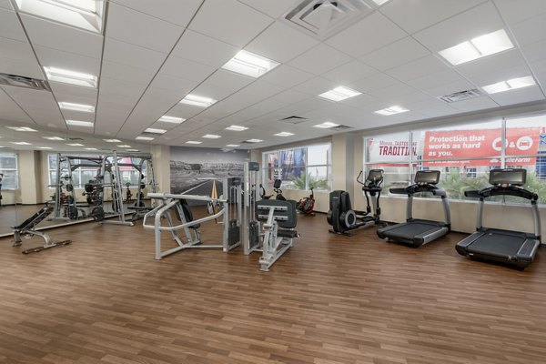 fitness center at The Lofts at Westgate Apartments