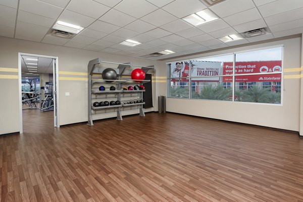 State-of-the-art fitness center featuring modern equipment at The Lofts at Westgate Apartments