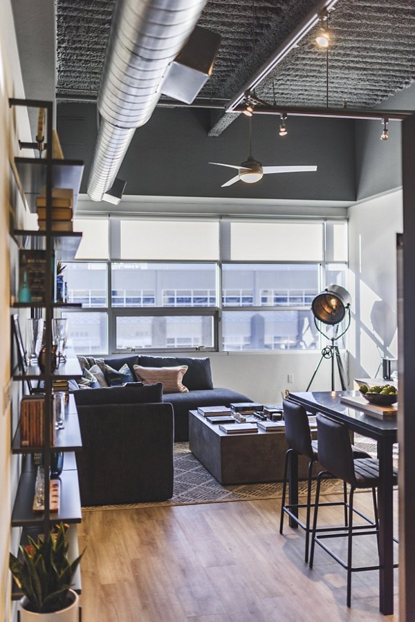 Modern kitchen with stainless steel appliances in The Lofts at Westgate Apartments