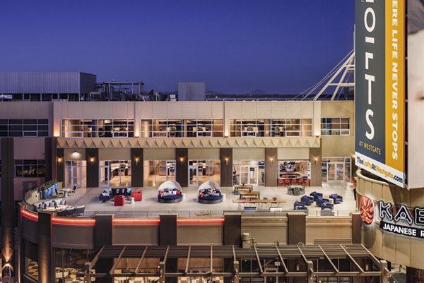 Rooftop deck with stylish seating and scenic views at The Lofts at Westgate Apartments, ideal for relaxation and social gatherings