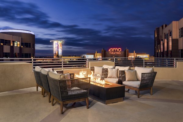 Outdoor fire pit lounge at The Lofts at Westgate Apartments, luxury living by Greystar