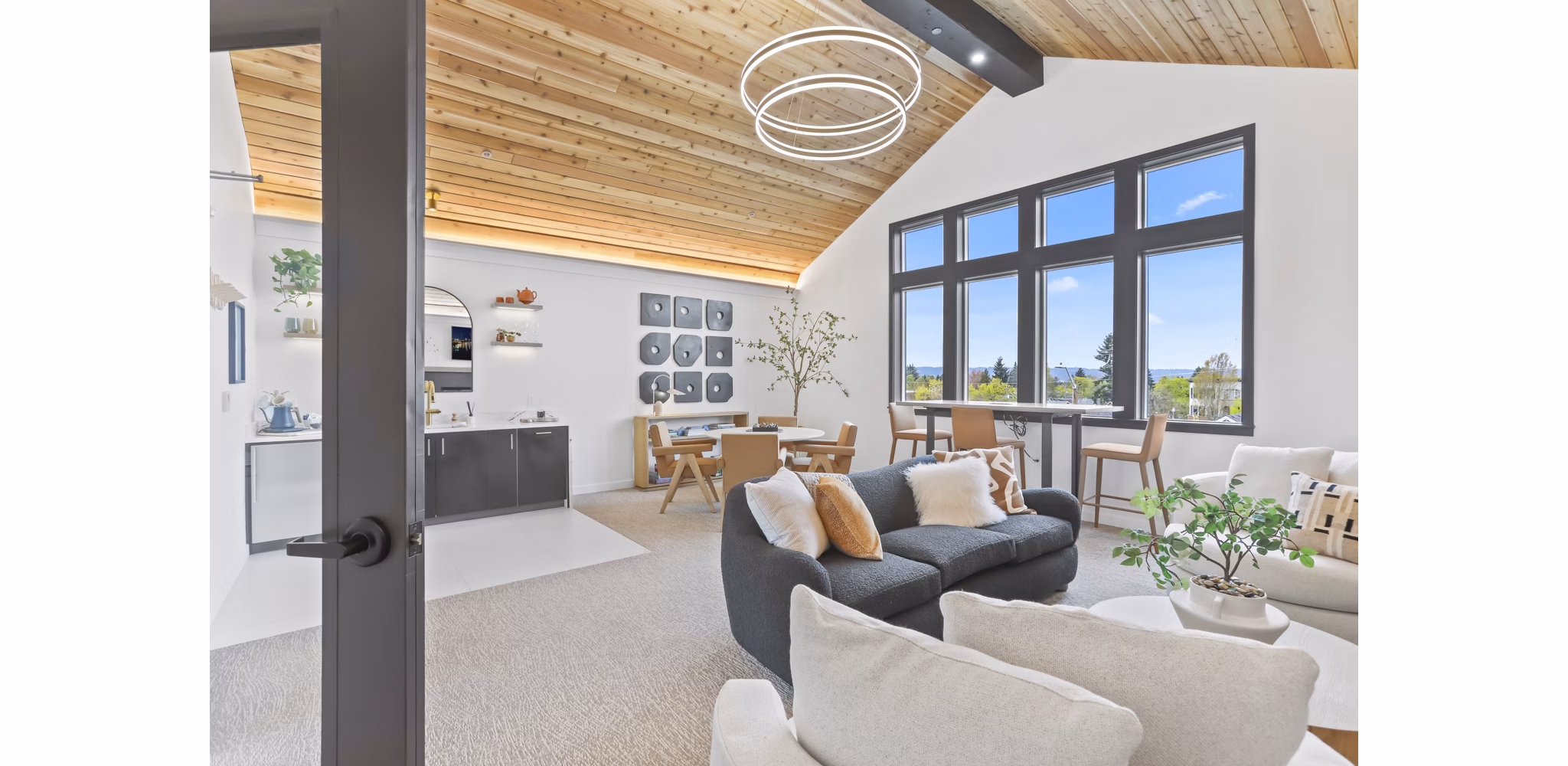 Modern clubhouse at Hudson West Apartments with elegant interior design and ample seating areas