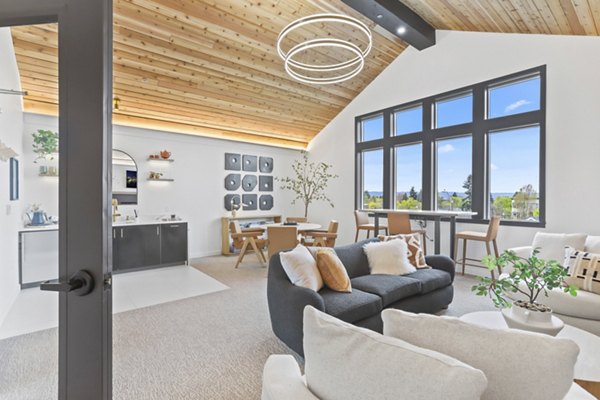 Modern clubhouse at Hudson West Apartments with elegant interior design and ample seating areas