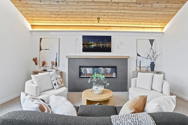 Clubhouse featuring modern lounge and entertainment area at Hudson West Apartments