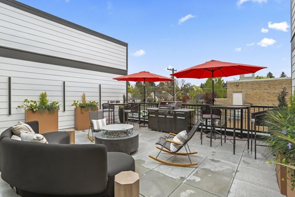 Scenic views from a stylish rooftop deck at Hudson West Apartments, perfect for relaxation and entertainment