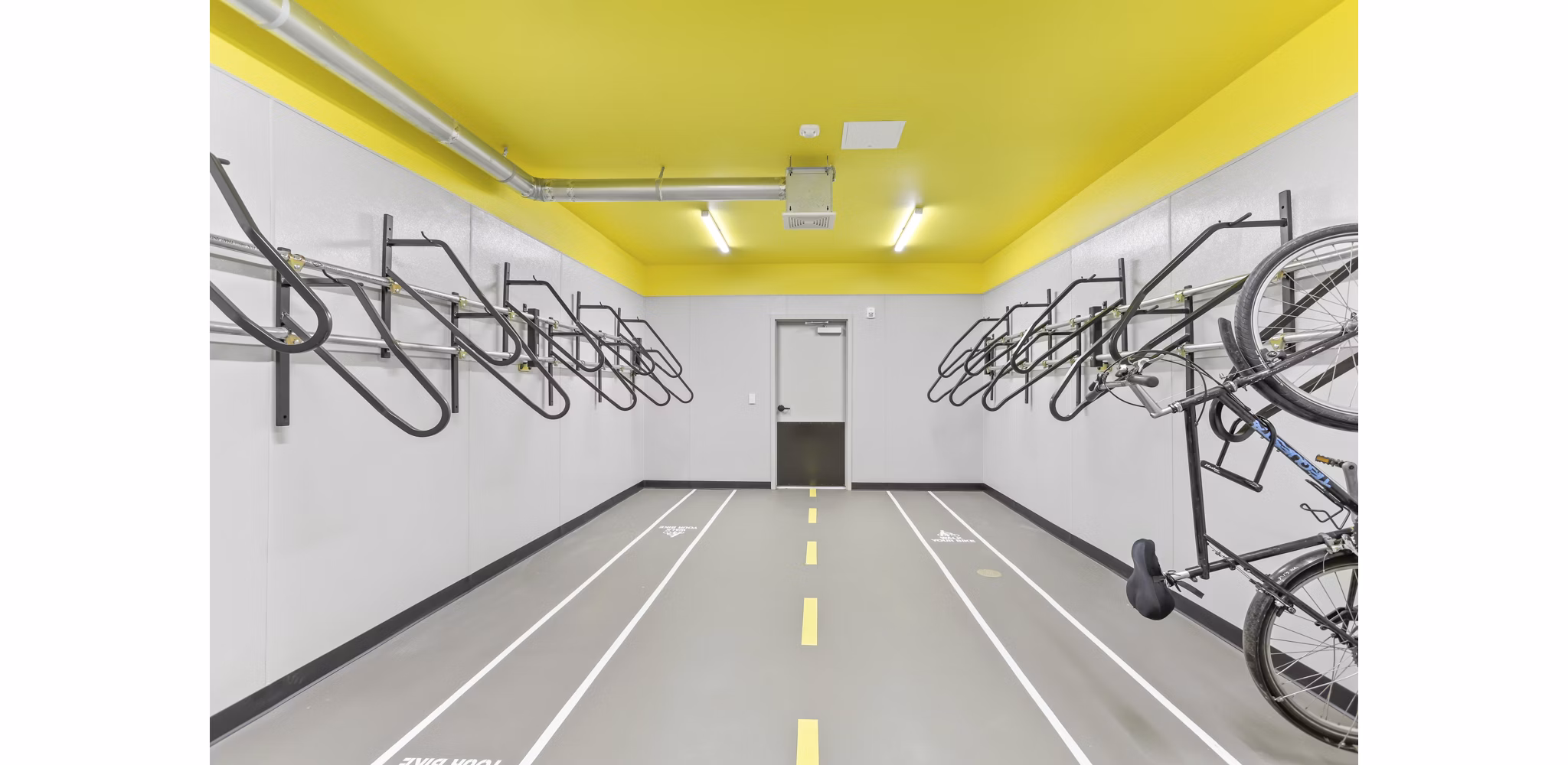 Secure bike storage area at Gossett on Church, luxury apartments in Nashville, featuring convenient racks and ample space for cyclists