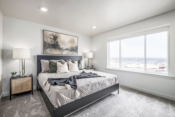 Modern bedroom design featuring stylish decor at Calypso Apartments