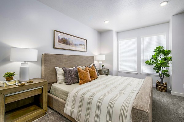 Elegant bedroom with modern decor at Calypso Apartments