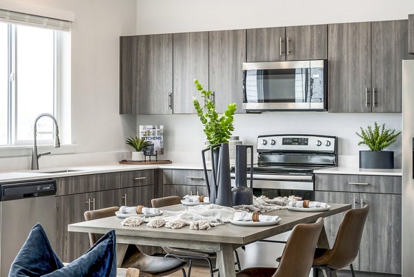 Dining room featuring modern decor and ambient lighting at Calypso Apartments