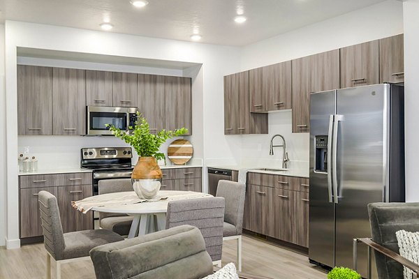 Spacious dining room with modern decor at Calypso Apartments in a luxury setting