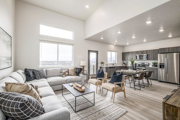 Spacious living room with modern dÃ©cor in Calypso Apartments