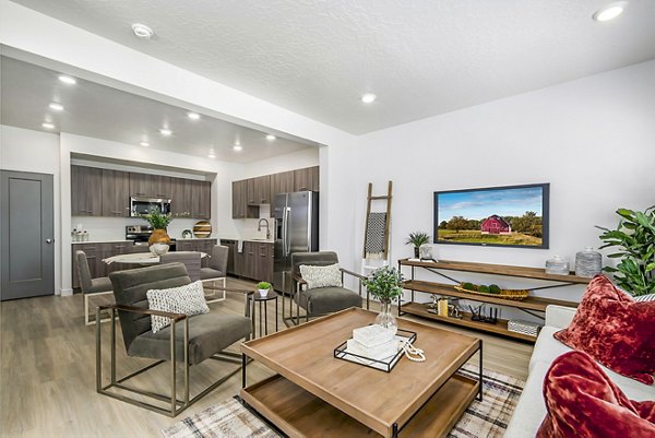Spacious living room with modern dÃ©cor in Calypso Apartments, luxury apartment living