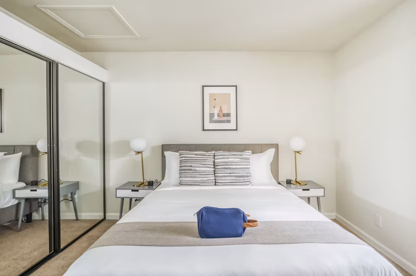 Luxurious bedroom with modern furnishings at Ygnacio Village Apartments, ideal for comfortable living