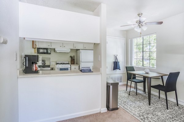 Modern kitchen with stainless steel appliances at Ygnacio Village Apartments